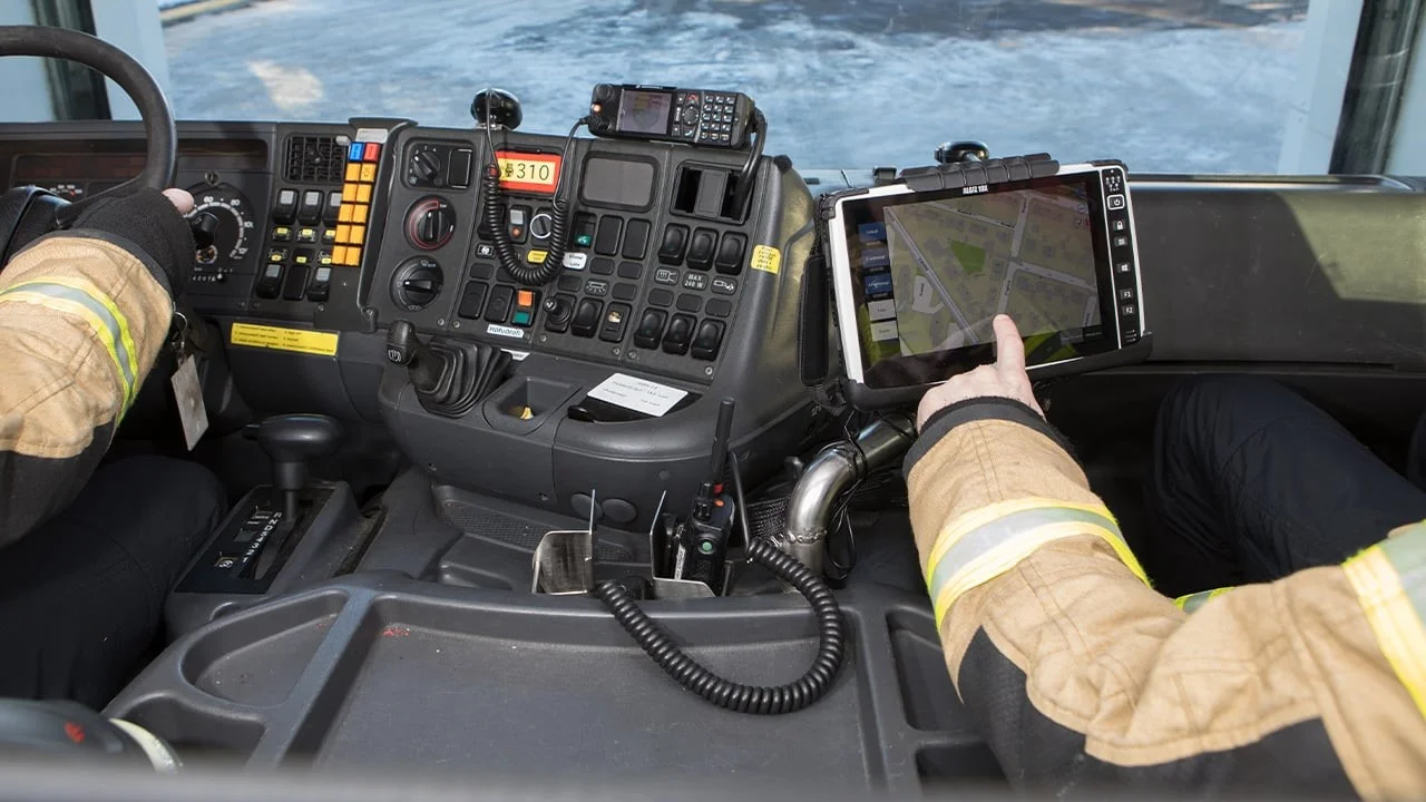 Firefighters using tablet